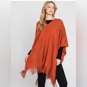 Paisley Patterned Fringe Poncho
Color Rust
Theme Fringe, Tassel
